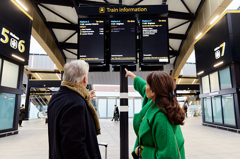 Image showing passengers checking train times board at the brand new London Gatwick train station